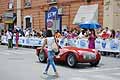 Fiat Barchetta 508S Colli datata 1950 in griglia affiancata dalla ragazza ombrellino. Alla guida Biagio e Giuseppe Fortunato al Gran Premio di Bari 2011